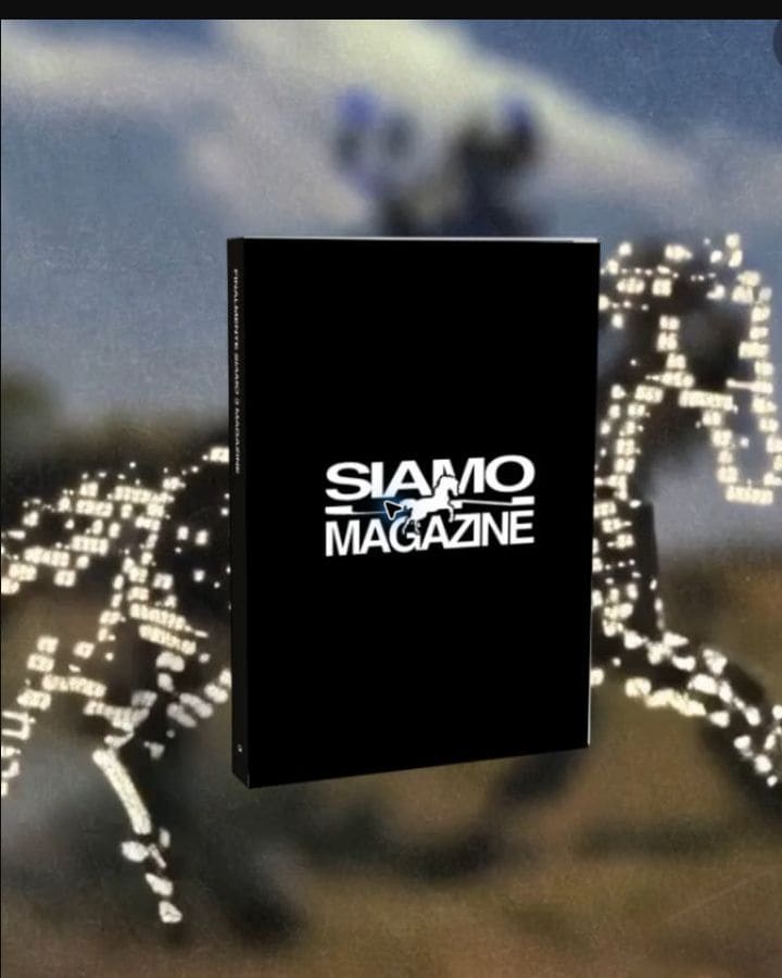 Terzo magazine SIAMO sospeso davanti a luci sfocate